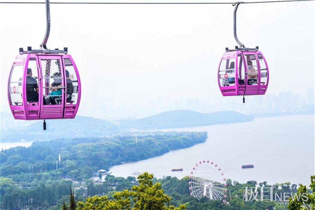 深受游客喜爱东湖绿道,深受游客喜爱磨山索道有了往年假日的排队现象